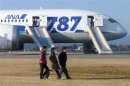 Passengers walk away from All Nippon Airways' (ANA) Boeing Co's 787 Dreamliner plane which made an emergency landing at Takamatsu airport, western Japan
