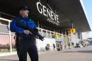 An armed policeman patrols on December 12, 2015 at Geneva Airport in Geneva