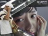 A shopper passes by an advertisement poster of Sony at a store in Tokyo, Thursday, Aug. 2, 2012.  Sony is reporting a bigger loss for the April-June quarter at 24.6 billion yen ($316 million) despite a sales recovery from a disaster-struck previous year. The Japanese electronics and entertainment company said Thursday its income was hurt by a surging yen, which erases overseas earnings, and by declining sales of liquid-crystal display TVs and video game machines. (AP Photo/Koji Sasahara)