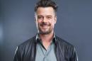 FILE - In this Jan. 27, 2016 file photo, Josh Duhamel poses for a portrait in New York. Duhamel is lending his star power to help disabled veterans by supporting a campaign that provides smart homes for injured American veterans, and he's encouraging others to do the same. The 43-year-old actor appears in a video that shows how the #EnlistMe effort restores independence to injured veterans by building wheelchair-accessible homes with high-tech digital features. (Photo by Scott Gries/Invision/AP, File)