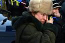 A woman cries during a rally in Kiev, on November 30, 2013