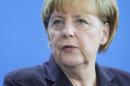 German Chancellor Merkel addresses a news conference after talks in Berlin
