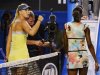 Maria Sharapova of Russia celebrates defeating Venus Williams of the U.S. in their women's singles match at the Australian Open tennis tournament in Melbourne