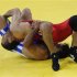 Saleh Emara of Egypt fights Saeid Abrahimi of Iran during their 96kg men's freestyle wrestling qualification match at the Beijing 2008 Olympic Games