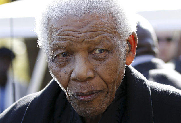 FILE - In this June 17, 2010 file photo, former South African President Nelson Mandela leaves the chapel after attending the funeral of his great-granddaughter Zenani Mandela in Johannesburg, South Africa. The South African presidency says Mandela has been discharged, Saturday, April 6, 2013, from a hospital after an improvement in his condition. Officials say he was treated for pneumonia. (AP Photo/Siphiwe Sibeko, Pool, File)