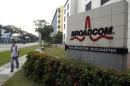Man passes Broadcom's Asia operations headquarters office at an industrial park in Singapore