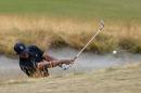 Tiger Woods hits out of the bunker on the second hole during the first round of the U.S. Open golf tournament at Chambers Bay on Thursday, June 18, 2015 in University Place, Wash. (AP Photo/Matt York)