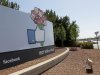 This May 11, 2012, photo shows a sign is shown at the Facebook campus in Menlo Park, Calif.  Half of Americans think Facebook is a passing fad, according to the results of an Associated Press-CNBC poll. And, in the run-up to the social network's initial public offering of stock, half of Americans also say the social network's asking price is too high. (AP Photo/Jeff Chiu)