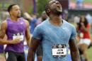 Justin Gatlin reacts after winning the 200-meter at the U.S. Track and Field Championships in Eugene, Ore., Sunday, June 28, 2015. (AP Photo/Don Ryan)