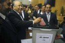 Parliament Speaker El-Katatni casts his vote during the two chambers of parliament meeting to elect the 100 members of the constituent assembly in Cairo