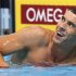 Phelps smiles after the men's 200m freestyle final during the U.S. Olympic swimming trials in Omaha