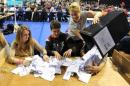Workers begin counting ballots after polling stations closed in the Referendum on the European Union in Glasgow