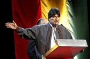 Bolivia's President Morales speaks to his compatriots during a meeting with social movement members in Barcelona