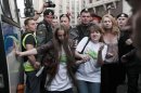 Police detain protesters during a demonstration by the Yabloko political party in Moscow