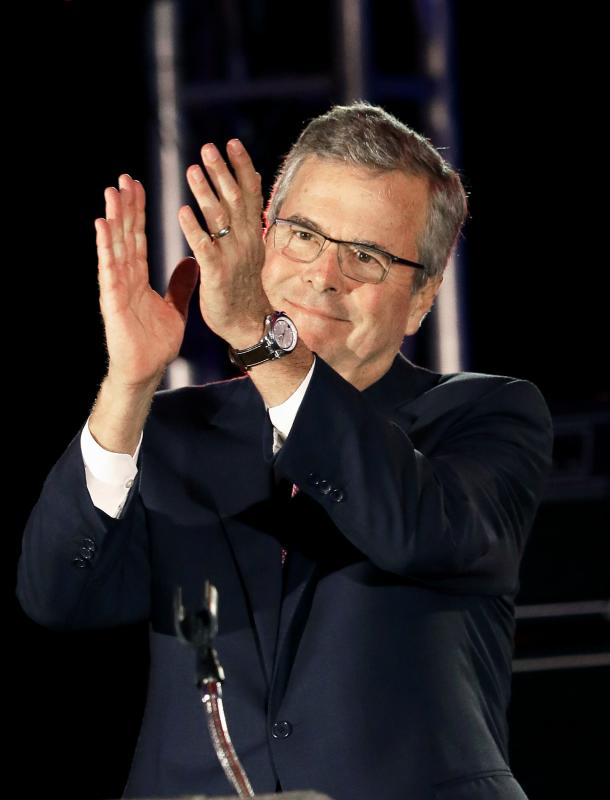 Former Florida Gov. Jeb Bush applauds his audience after speaking to the National Christian Hispanic Leadership Conference in Houston, Tuesday, April 29, 2015. It is his second appearance with a Spanish-speaking audience this week. (AP Photo/Pat Sullivan)