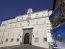 A calendar with a picture of Pope Benedict XVI on its cover is seen in front of his summer residence of Castel Gandolfo