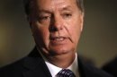 U.S. Senator Lindsey Graham (R-SC) speaks to the press following his private meeting with United States U.N. Ambassador Susan Rice about the attack on U.S. diplomats in Benghazi, Libya in Washington