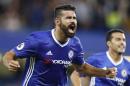 Chelsea's Diego Costa celebrates after scoring during the English Premier League soccer match between Chelsea and West Ham at Stamford Bridge stadium in London, Monday, Aug. 15, 2016.(AP Photo/Frank Augstein)