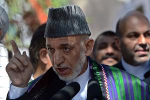 Afghan President Hamid Karzai speaks to the media after &hellip;