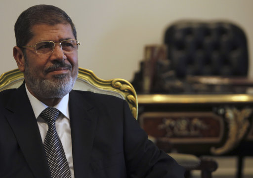 Egypt's President Mohamed Mursi attends a meeting at the presidential palace in Cairo