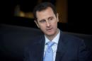 Syria's President Bashar al-Assad is seen during an interview in Damascus
