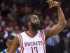 Houston Rockets' James Harden signals to the crowd after shooting a 3-point basket during the first quarter of an NBA basketball game against the Golden State Warriors, Tuesday, Feb. 5, 2013, in Houston. (AP Photo/Dave Einsel)