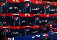 Cases of Pepsi are displayed for sale in Carlsbad, California February 7, 2012. REUTERS/Mike Blake