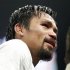 Manny Pacquiao of the Philippines reacts after losing his WBO welterweight title fight against Timothy Bradley Jr. of the U.S. in Las Vegas