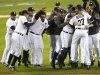 The Detroit Tigers celebrate after defeating the New York Yankees in Game 4 of their MLB ALCS baseball playoff series and advancing to the World Series, in Detroit