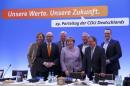 German Chancellor and leader of the conservative CDU Angela Merkel poses with CDU leaders in Essen