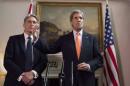 Britain's Foreign Secretary Phillip Hammond and U.S. Secretary of State John Kerry deliver a statement at a press conference in London