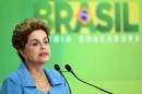 Brazilian President Dilma Rousseff speaks during a press conference at Planalto Palace in Brasilia on April 18, 2016