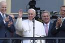 Pope Francis, accompanied by, from left, Vice President Joe Biden, Senate Majority Leader Mitch McConnell of Ky., House Majority Leader Kevin McCarthy of Calif., and House Speaker John Boehner of Ohio, speaks to the crowd from the Speaker's Balcony on Capitol Hill, Thursday, Sept. 24, 2015, after his address to a joint meeting of Congress making him the first pontiff in history to do so. (AP Photo/Susan Walsh)