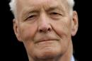 FILE - Former British Labour party politician Tony Benn poses for a portrait during a rally in Hyde Park, London, in this Saturday Sept. 24, 2005 file photo. Benn, a committed British socialist who irritated, fascinated _ and bored _ Britons through a political career spanning more than five decades and who renounced his aristocratic title rather than leave the House of Commons, has died. He was 88. His family said in a statement that Benn died peacefully at his home in west London on Friday. It did not give a cause for death. (AP Photo/Matt Dunham, File)