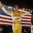 Ryan Hunter-Reay celebrates his victory in the IndyCar auto race at Auto Club Speedway in Fontana, Calif., Saturday, Sept. 15, 2012. (AP Photo/Reed Saxon)