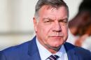 FILE - In this Sunday Sept. 4, 2016 file photo England's coach Sam Allardyce watches from the sidelines during their World Cup Group F qualifying soccer match against Slovakia in Trnava, Slovakia. England manager Sam Allardyce's comments during a newspaper sting will be examined by his employers at the Football Association, after he was filmed by Britain's Daily Telegraph newspaper appearing to advise undercover reporters posing as businessmen on how to sidestep an outlawed player transfer practice. (AP Photo/Bundas Engler, File)