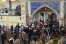 Sunni Muslims leave the mosque after Friday prayers in Ramadi