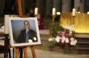 A picture of slain French parish priest Father Jacques Hamel is seen during a funeral service at the Cathedral in Rouen