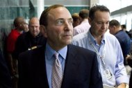 NHL commissioner Gary Bettman leaves after speaking to reporters after  NHL labor talks in Toronto, Thursday, Aug. 23, 2012. (AP Photo/The Canadian, Chris Young)