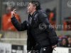 Dijon's head coach Carteron directs his players during their French Ligue 1 soccer match in Marseille