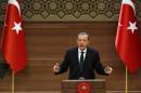 Turkish President Recep Tayyip Erdogan addresses a meeting at the presidential palace in Ankara on August 12, 2015