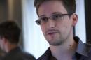 This still image from video recorded on June 6, 2013, and released to AFP on June 10, 2013, shows Edward Snowden speaking during an interview with The Guardian newspaper at an undisclosed location in Hong Kong.