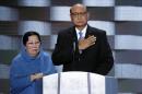 FILE - In this July 28, 2016, file photo, Khizr Khan, father of fallen Army Capt. Humayun Khan and his wife Ghazala speak during the final day of the Democratic National Convention in Philadelphia. Many Muslim Americans cringe at the way they have been portrayed by candidates during the presidential campaign, either as potential terrorists or as eyes and ears who can help counterterrorism efforts. Those descriptions have been offered by Donald Trump and Hillary Clinton, respectively. And they trouble Muslims who complain they are being pigeonholed and their concerns on other issues ignored. (AP Photo/J. Scott Applewhite, File)