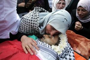 The mother of Eyad Awawda mourns over his body on October &hellip;