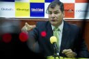 Ecuador's President Rafael Correa gestures during an interview in Loja