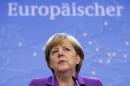 Germany's Chancellor Merkel addresses a news conference during a EU leaders summit in Brussels