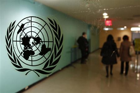The United Nations logo is displayed on a door at U.N. headquarters in New York February 26, 2011. REUTERS/ Joshua Lott