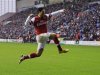 Arsenal's Arteta celebrates scoring against Wigan Athletic during their English Premier League soccer match in Wigan