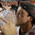 Alabama's AJ McCarron kissed The Coaches' Trophy after the BCS National Championship college football game against Notre Dame Monday, Jan. 7, 2013, in Miami. Alabama won 42-14. (AP Photo/David J. Phillip)