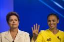 Brazil's President Dilma Rousseff, presidential candidate for re-election of the Workers Party, PT, left, poses for a photo next to Marina Silva, presidential candidate of the Brazilian Socialist Party, PSB, as they arrive for a televised presidential debate in Rio de Janeiro, Brazil, Thursday, Oct. 2, 2014. Brazil will hold general elections on Oct. 5. (AP Photo/Felipe Dana)